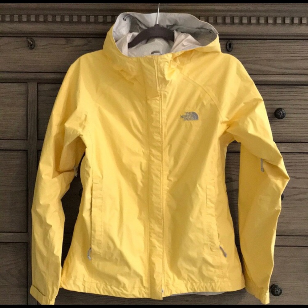 The North Face omnitech pastel yellow rain jacket